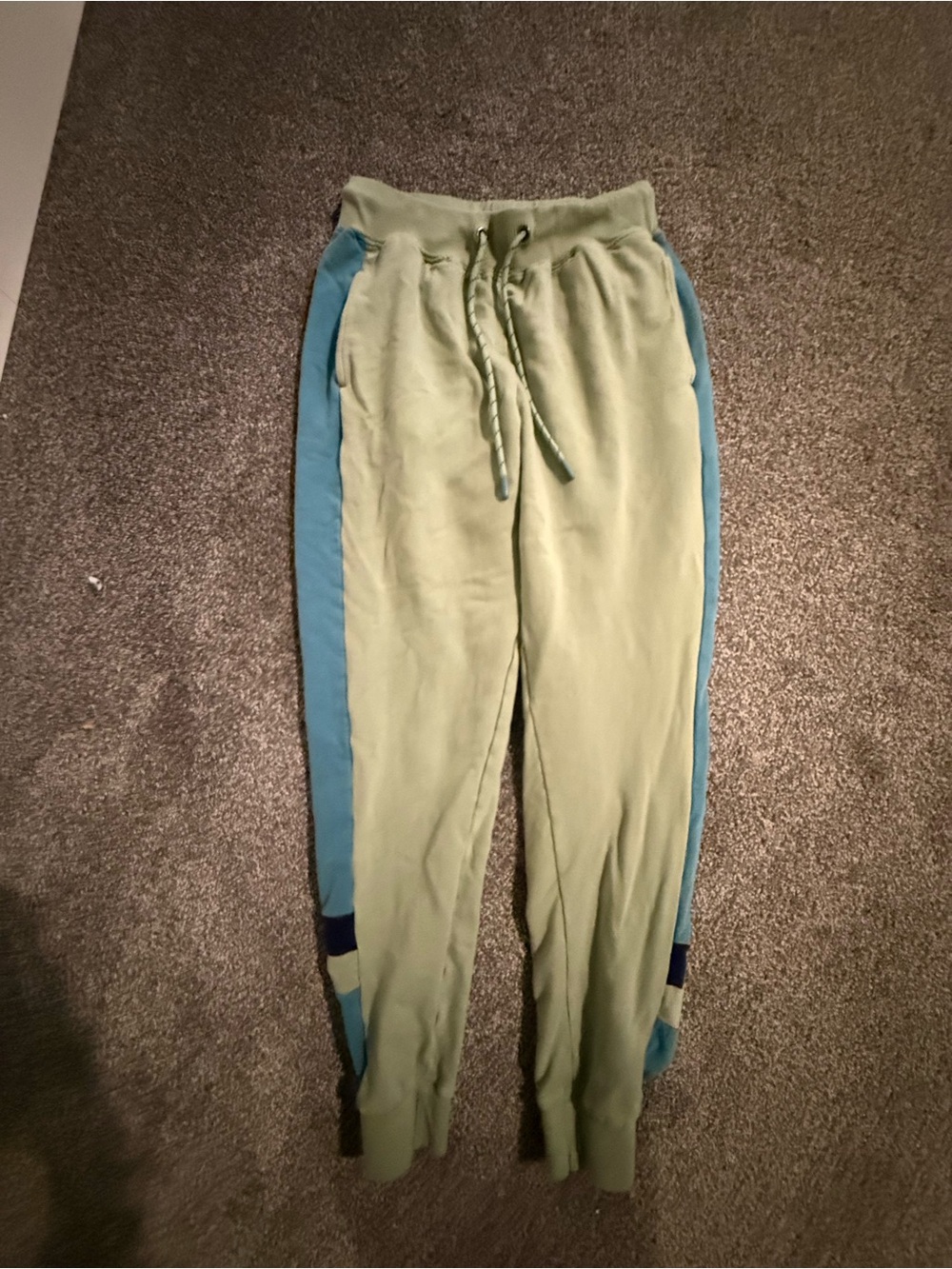 Cotopaxi women’s small light Green Joggers sweatpants with Blue Side Panels